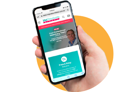 Person holding phone with Vet Products Direct website